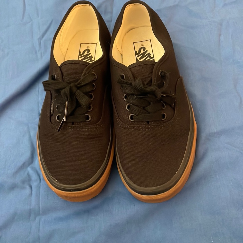 Black Vans with gum sole